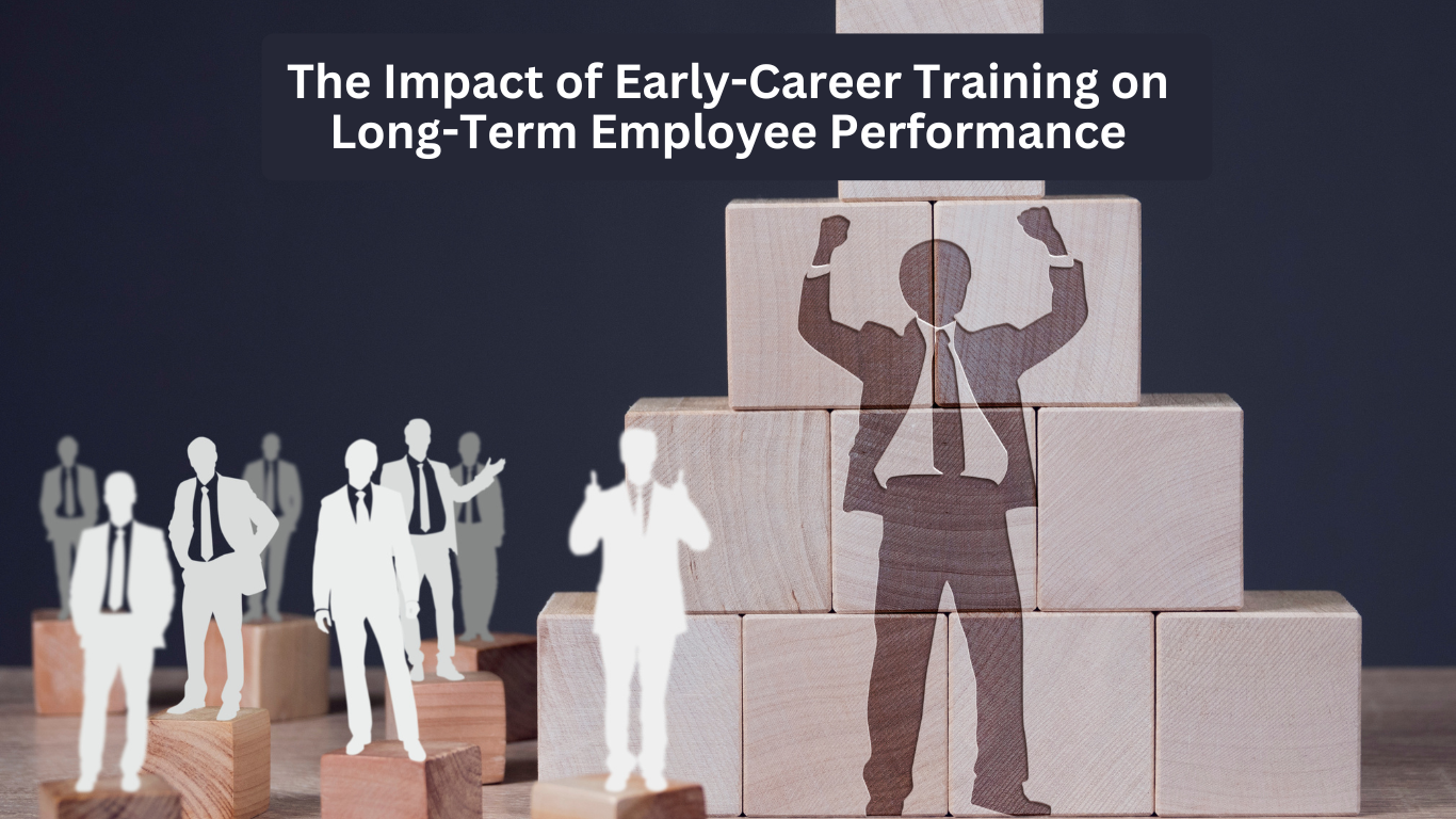 Wooden blocks forming a pyramid with a business professional’s silhouette, representing career growth through early-career training, while white cut-out figures stand on lower blocks.